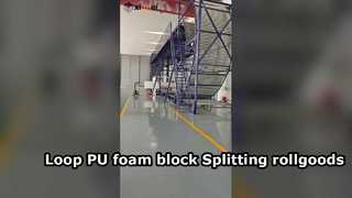 La macchina automatica con guida a coltello a nastro Loop Cutter che divide lunghi blocchi di schiuma PU in schiuma in rotolo